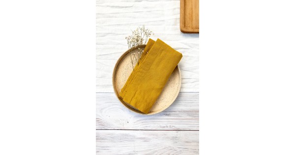 https://www.touchablelinen.com/image/cache/catalog/products/22/Linen-napkins-in-mustard-yellow-6-600x315.jpg