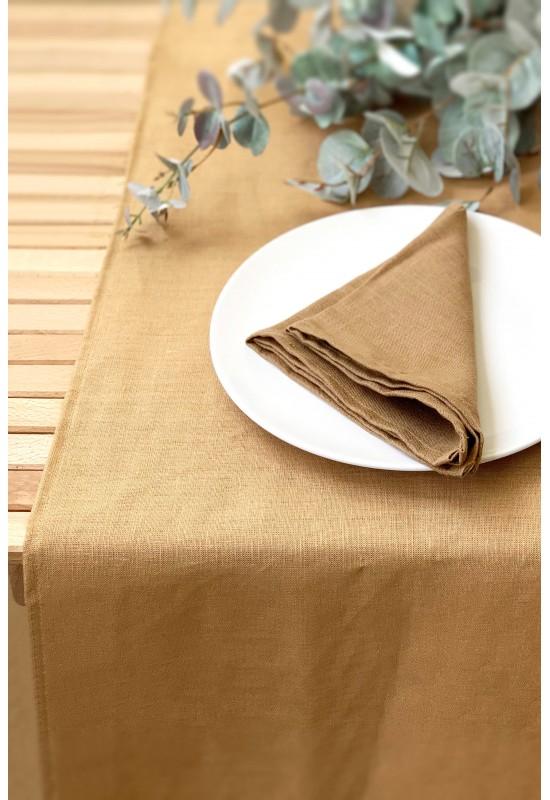 Golden brown linen table runner setting wedding